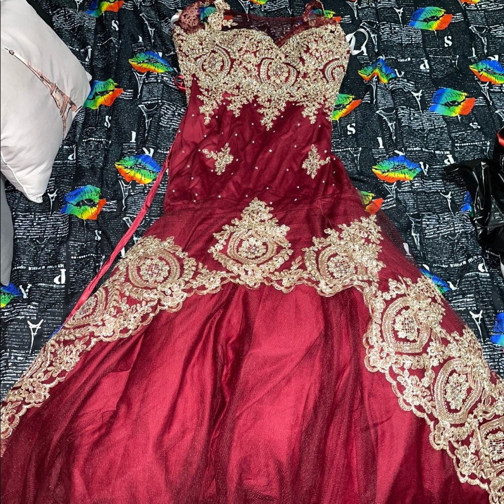 This dress was only worn once and it is still in excellent condition!